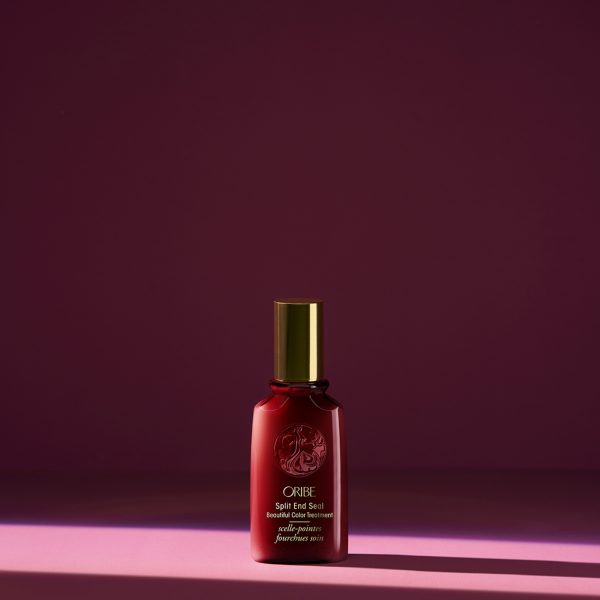 Luxury red perfume bottle on dark background