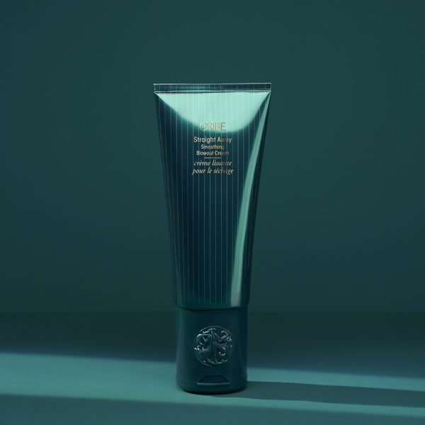 Green tube of cosmetic product on display