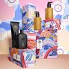 Colorful haircare products with artistic packaging design.
