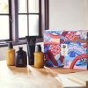 Colorful haircare products on wooden table display