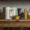 Luxury hair care products on wooden shelf